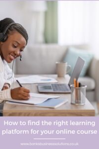 Which learning platform is best for a small business? - Picture of a lady in headphones writing on a piece of paper