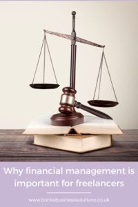 Why financial management is important for freelancers - picture of some scales on top of two books