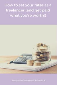 How to find your rates as a freelancer - picture of a calculator and piles of money