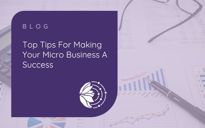 Top Tips For Making Your Micro Business A Success - picture of a pen, glasses and spreadsheets on paper on a desk